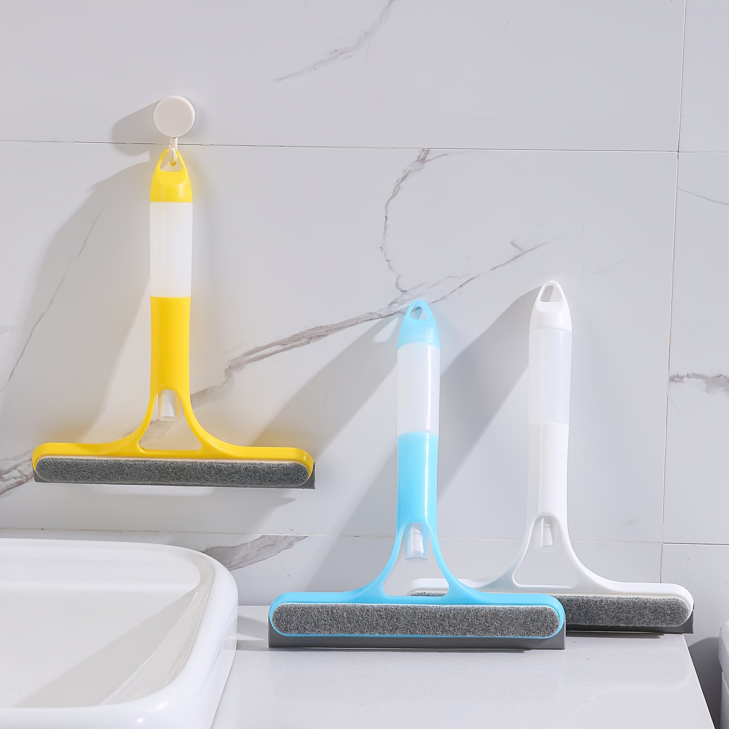 Pro 3-in-1 Window Cleaner: Scraper, Microfiber and Integrated Brush.