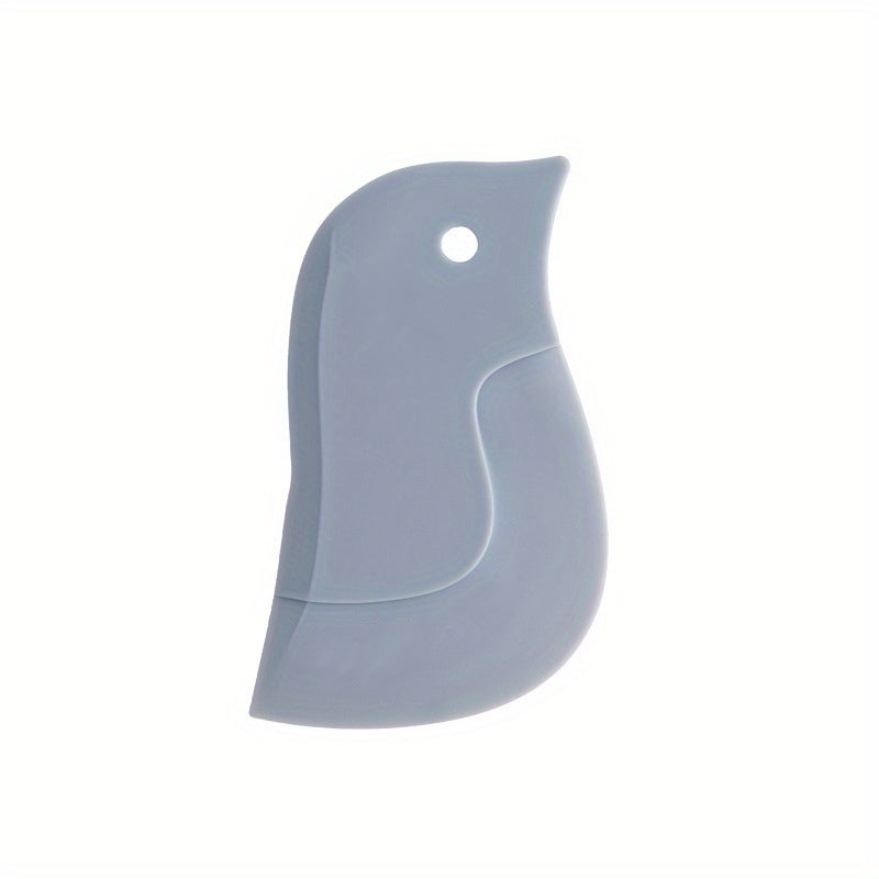 Silicone kitchen scraper with penguin design for cleaning grease and food scraps