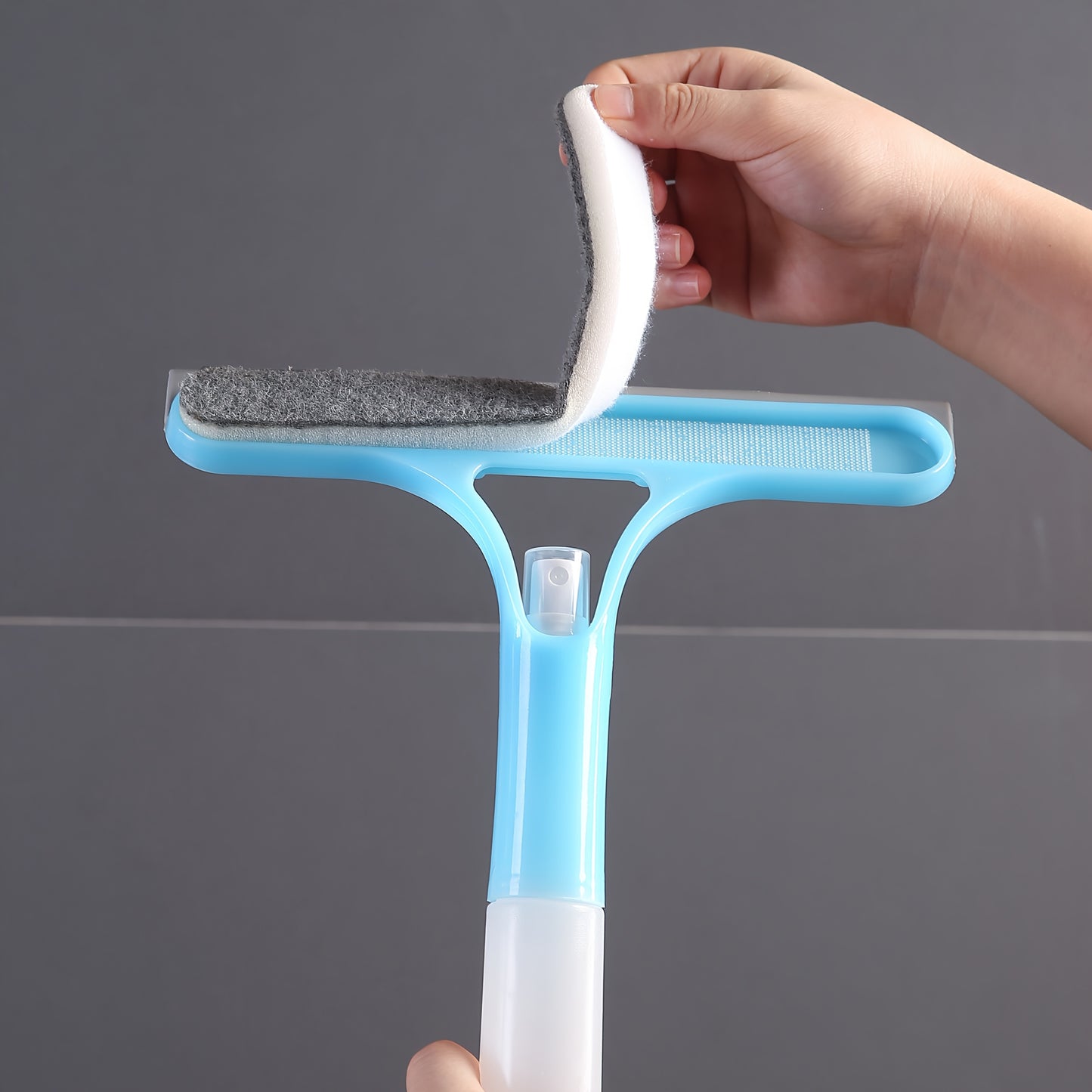 Pro 3-in-1 Window Cleaner: Scraper, Microfiber and Integrated Brush.